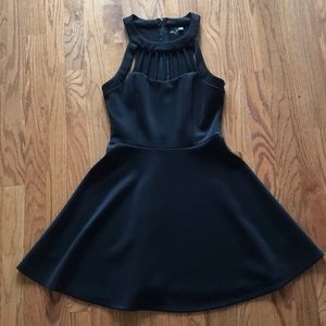Black mini dress with cut outs on front